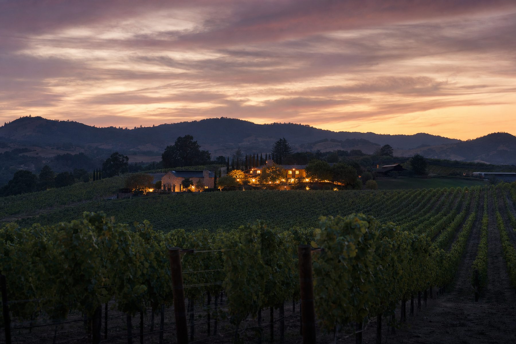 A vineyard estate glowing at dusk in Healdsburg